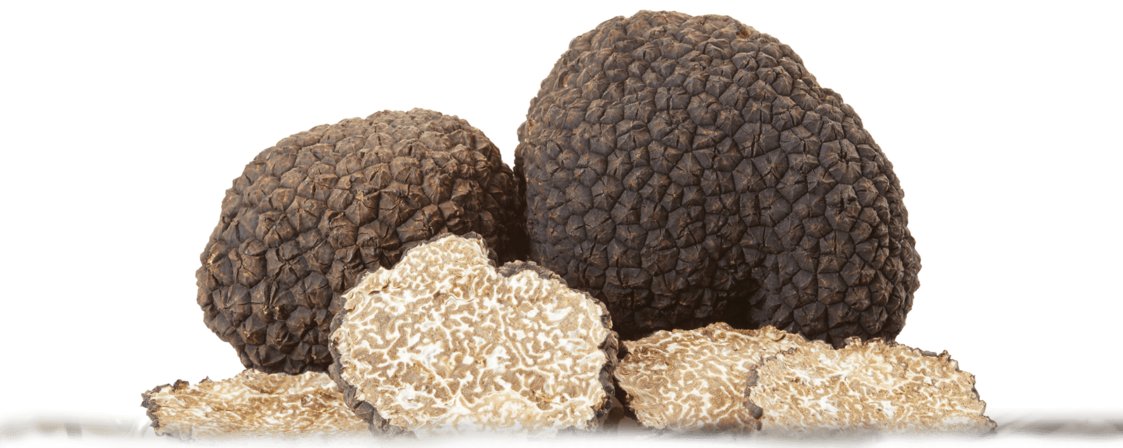 Whole black truffles used in MouCo Truffello, known for their deep, earthy aroma and luxurious flavor.