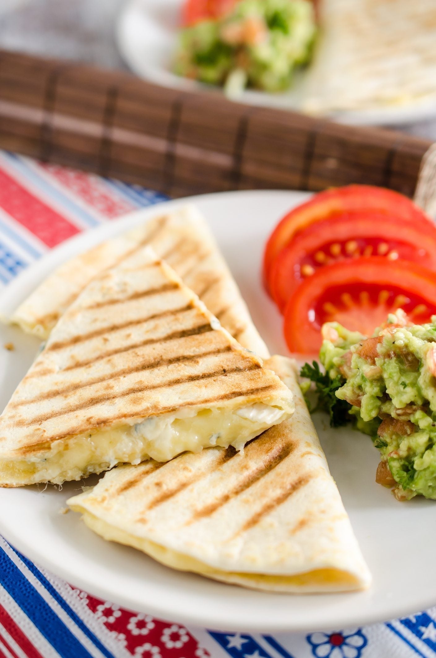 Golden quesadilla stuffed with MouCo Camembert, bacon, ham, and melted Colby—crispy, cheesy, and easy enough for kids to help make or pack in a lunch.