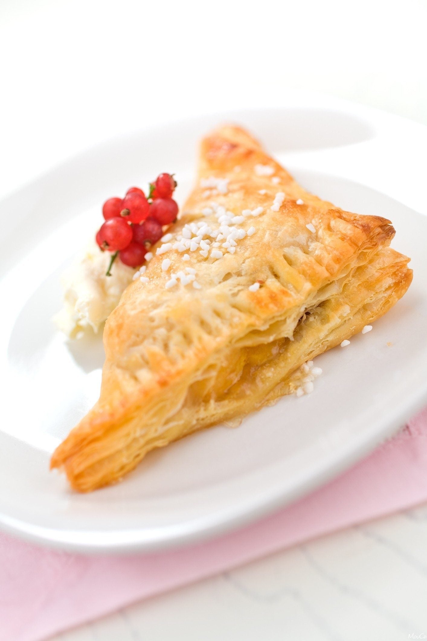 Mini peach tartelettes topped with rich MouCo Truffello—real truffle cheese meets stone fruit sweetness in this upscale bite.