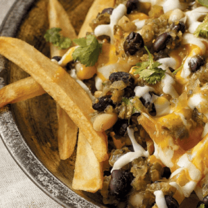 Close-Up of MouCo Green Chili Poutine with Cheese Curds and Fries