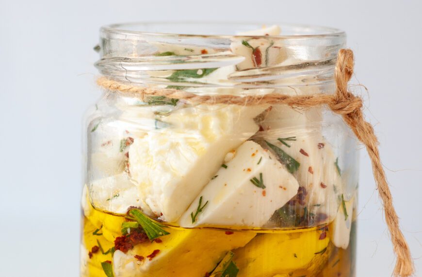 Marinated MouCo cheese curds in a jar.